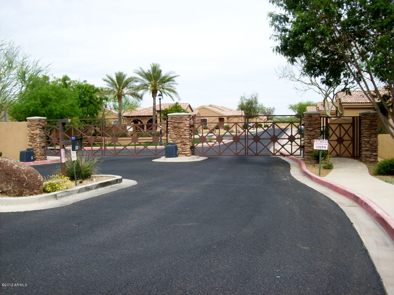 2565 South Signal Butte Road, Unit 39 Mesa, AZ 85209 - Photo 28 of 28 a view of a street with cars
