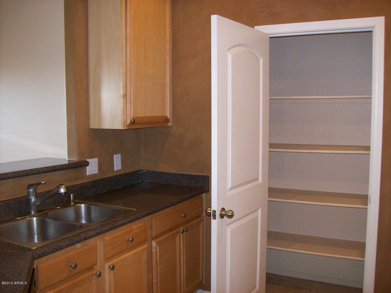 2565 South Signal Butte Road, Unit 39 Mesa, AZ 85209 - Photo 7 of 28 a close view of sink and tap