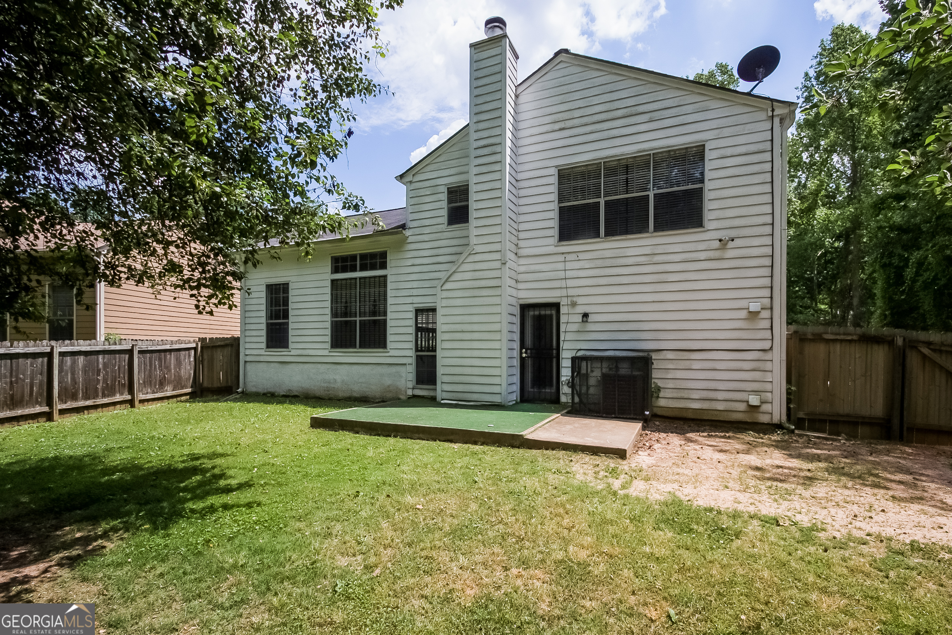 6350 Laurel Post Drive Lithonia, GA 30058 - Photo 15 of 15 a view of a house with a yard