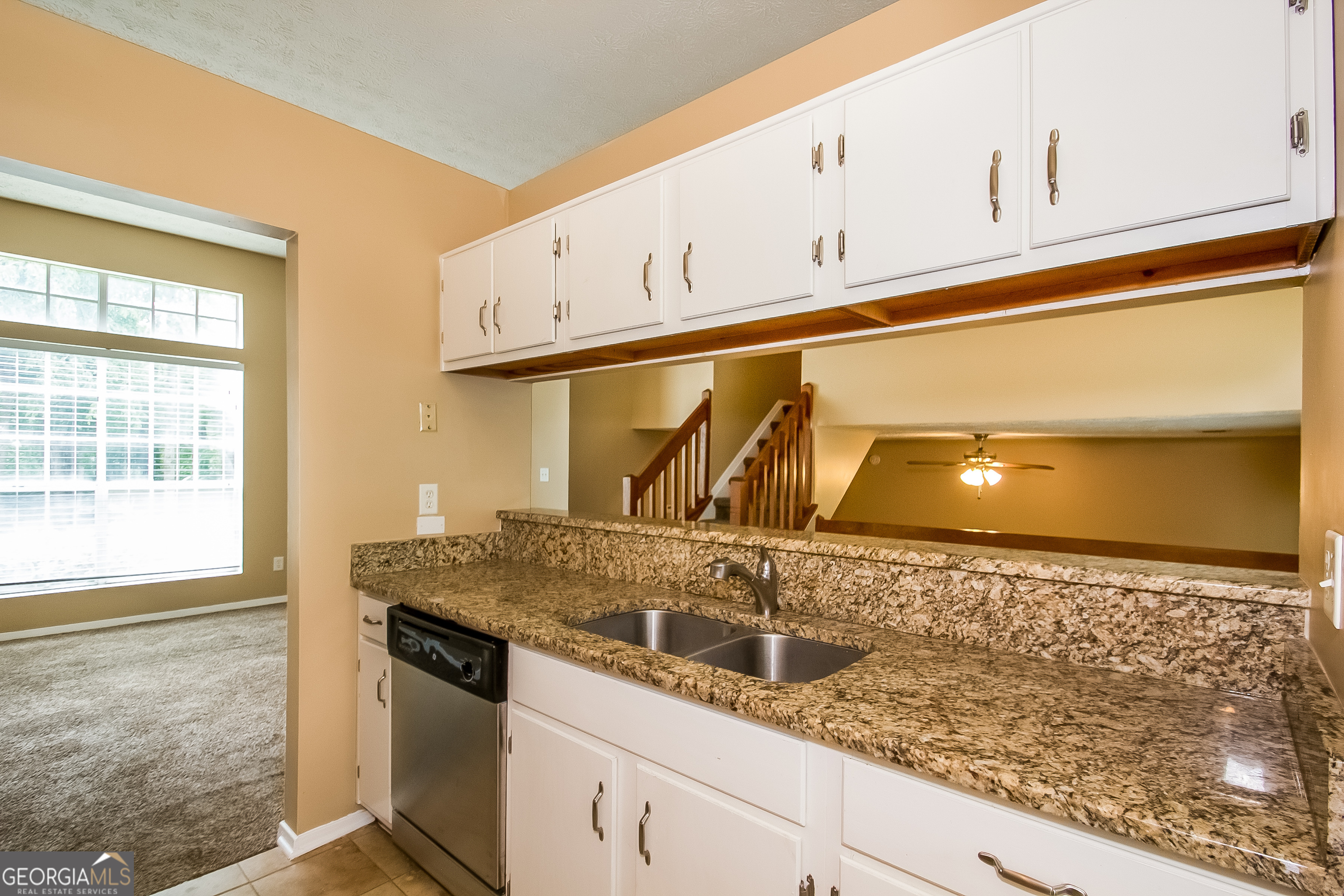 6350 Laurel Post Drive Lithonia, GA 30058 - Photo 7 of 15 a bathroom with a granite countertop sink and vanity