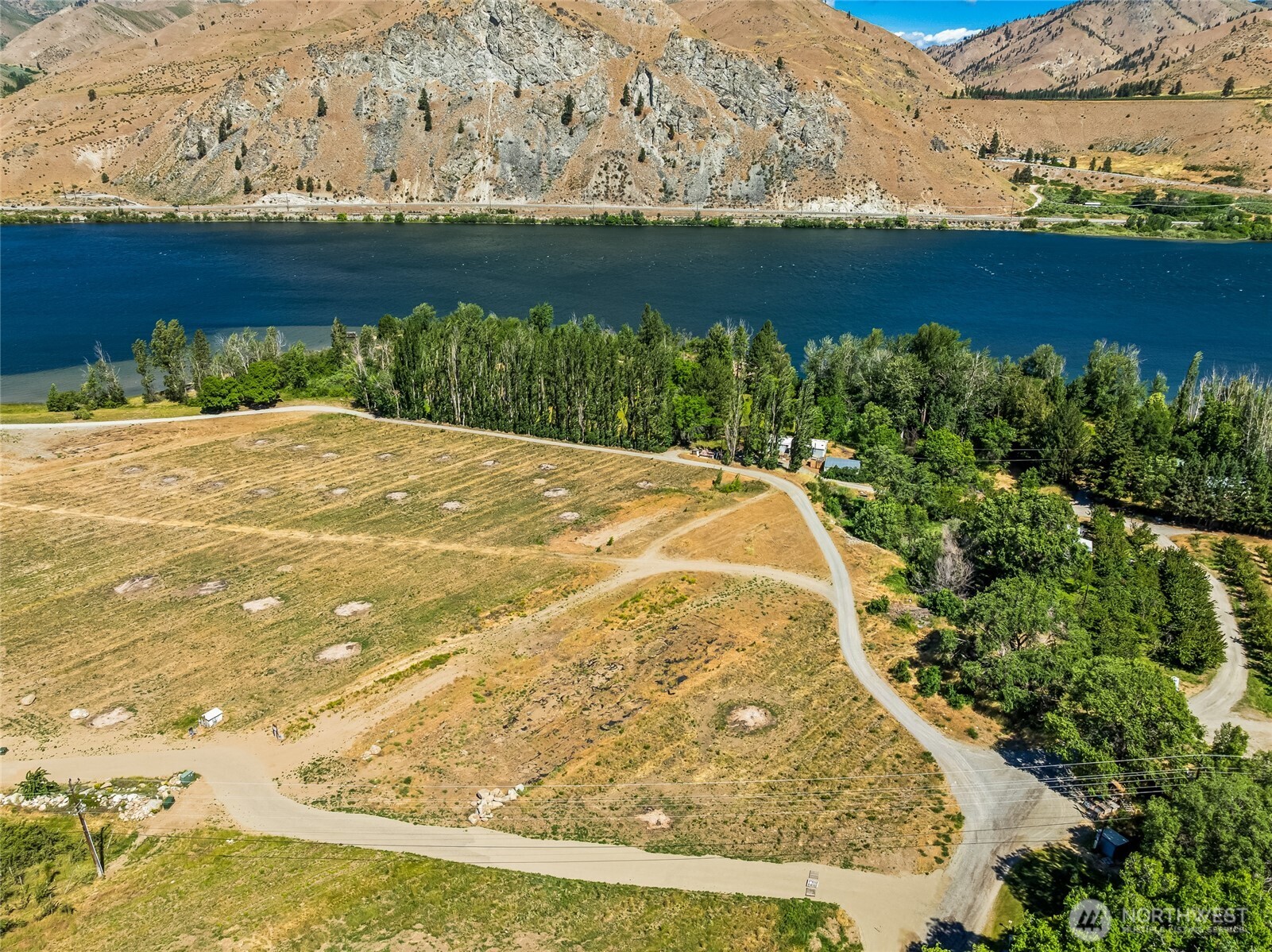 0 Lot 5 Silvest Road Orondo, WA 98843 - Photo 10 of 17 a view of a swimming pool with an outdoor space and seating area