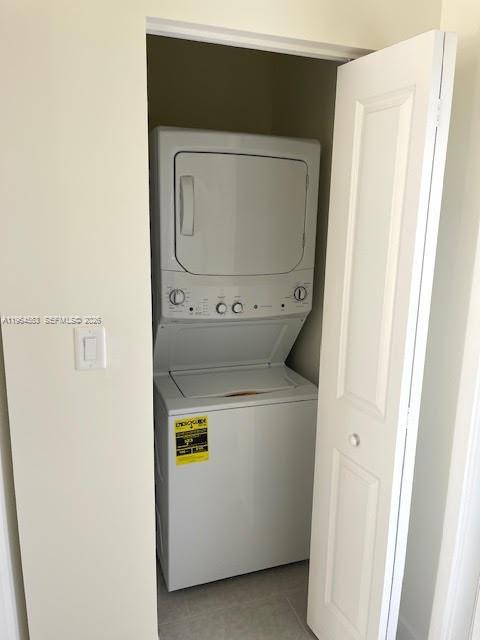 8167 Northwest 41st Street, Unit E111 Doral, FL 33166 - Photo 6 of 14 a utility room with dryer and washer