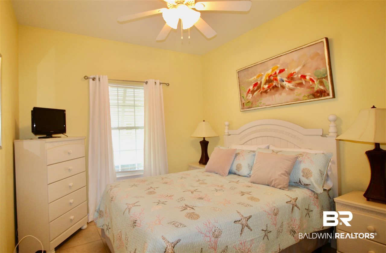 4374 Lindsey Lane, Unit 4374A Orange Beach, AL 36561 - Photo 16 of 20 Guest room with queen sized bed