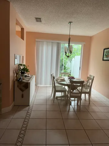 a table and chairs in a room