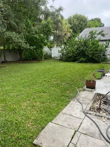 a view of a garden with a bench
