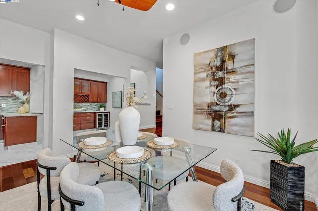 a view of a dining room with furniture window and wooden floor