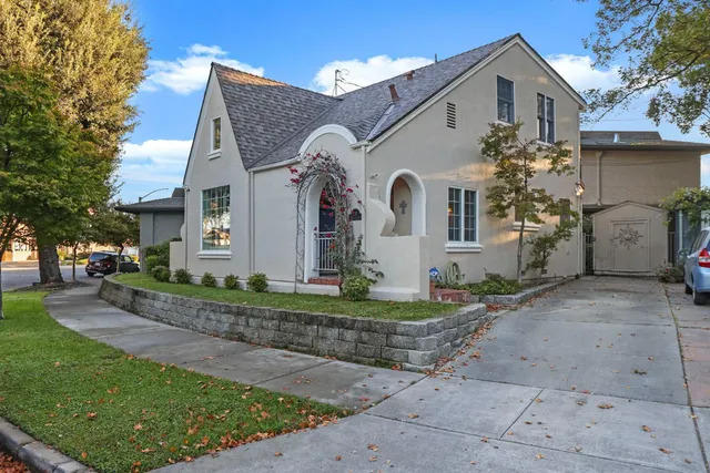 front view of a house with a yard