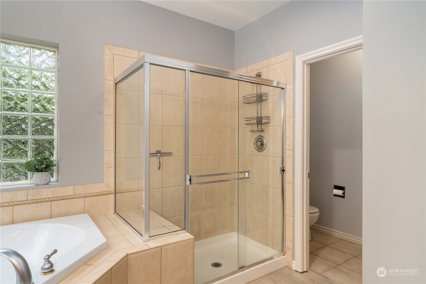 27730 Maple Ridge Way Southeast Maple Valley, WA 98038 - Photo 25 of 39 a bathroom with a shower and a sink