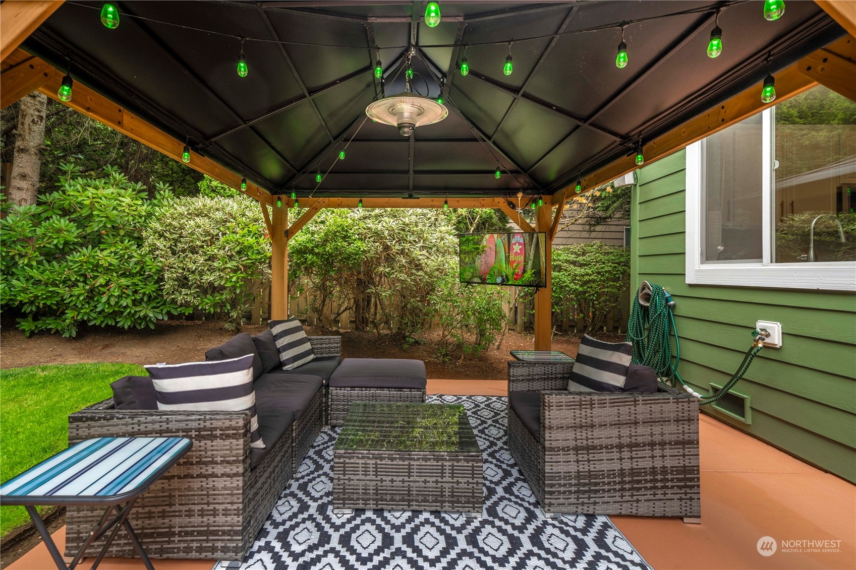 27730 Maple Ridge Way Southeast Maple Valley, WA 98038 - Photo 33 of 39 a outdoor living space with patio furniture and garden