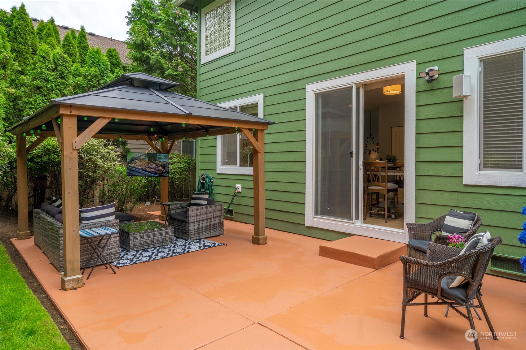 27730 Maple Ridge Way Southeast Maple Valley, WA 98038 - Photo 34 of 39 a backyard of a house with seating space