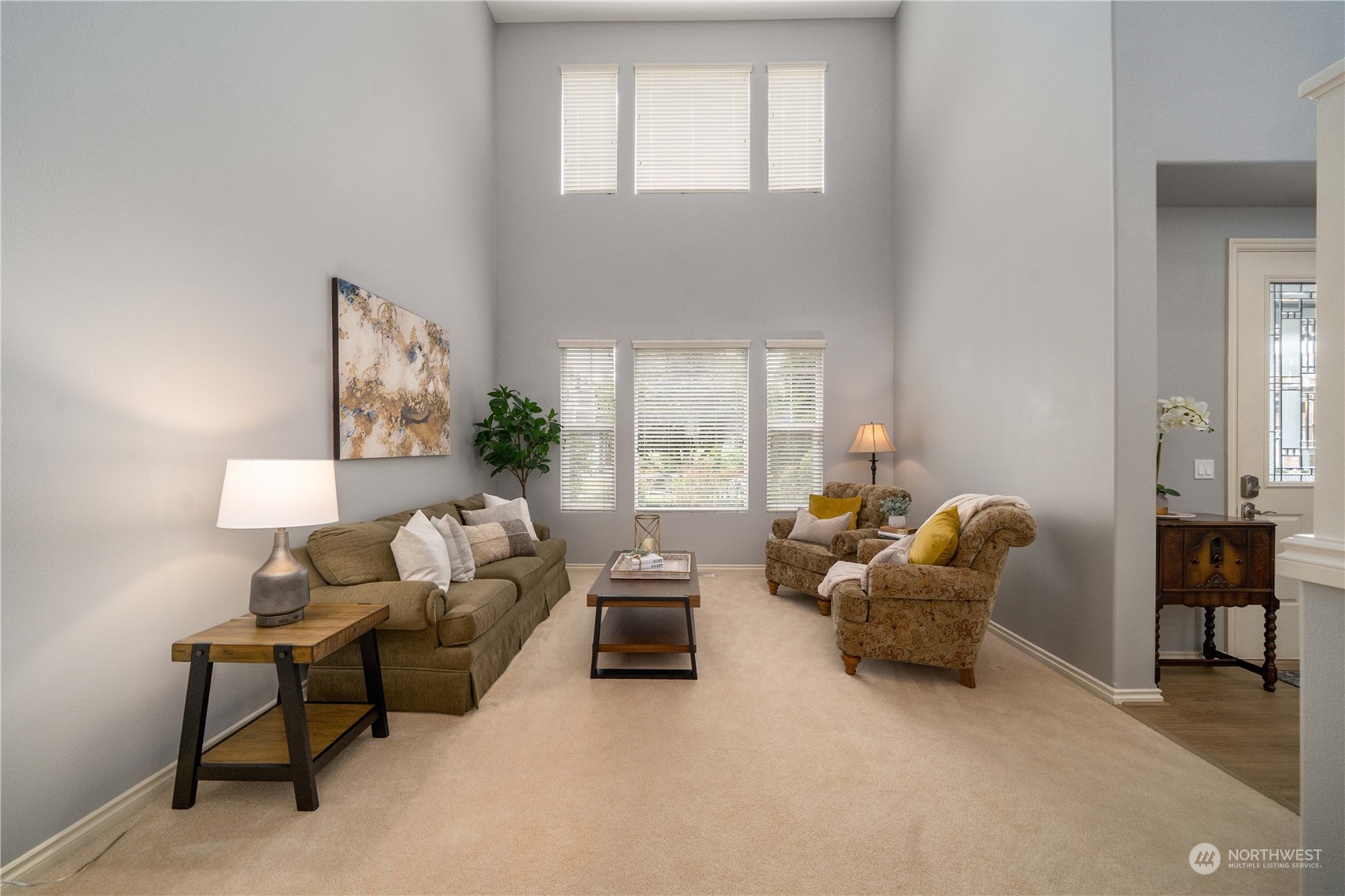 27730 Maple Ridge Way Southeast Maple Valley, WA 98038 - Photo 9 of 39 a living room with furniture and a large window