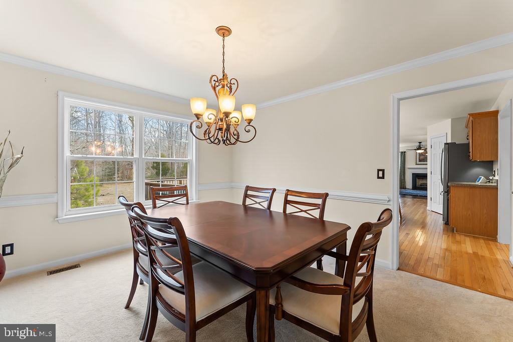 6917 River Road Fredericksburg, VA 22407 - Photo 12 of 89 The dining room has views of the backyard.
