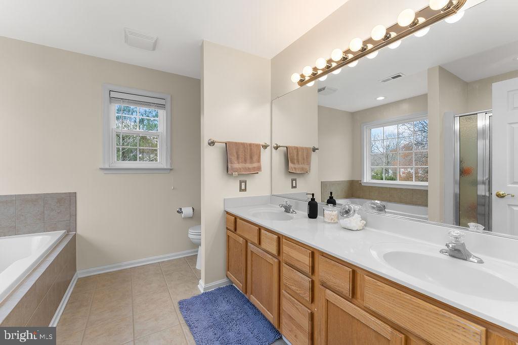 6917 River Road Fredericksburg, VA 22407 - Photo 32 of 89 The Primary Bath has a double vanity.