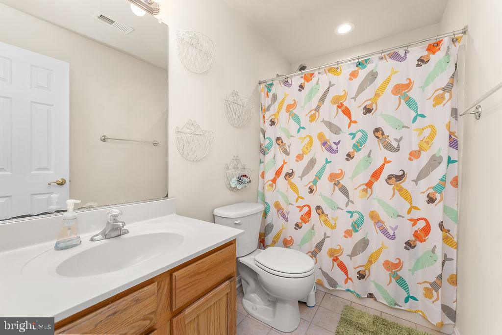 6917 River Road Fredericksburg, VA 22407 - Photo 36 of 89 Bedroom #2 has an attached full bath.