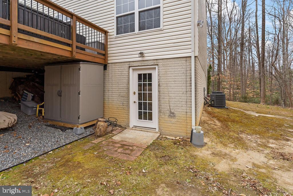 6917 River Road Fredericksburg, VA 22407 - Photo 51 of 89 Basement walk out level door.