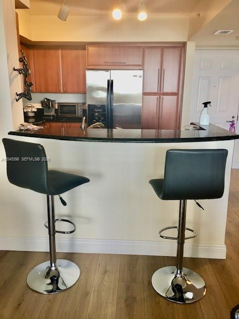 3232 Southwest 22nd Terrace, Unit 1303 Miami, FL 33145 - Photo 12 of 43 a kitchen with a counter space a sink and cabinets