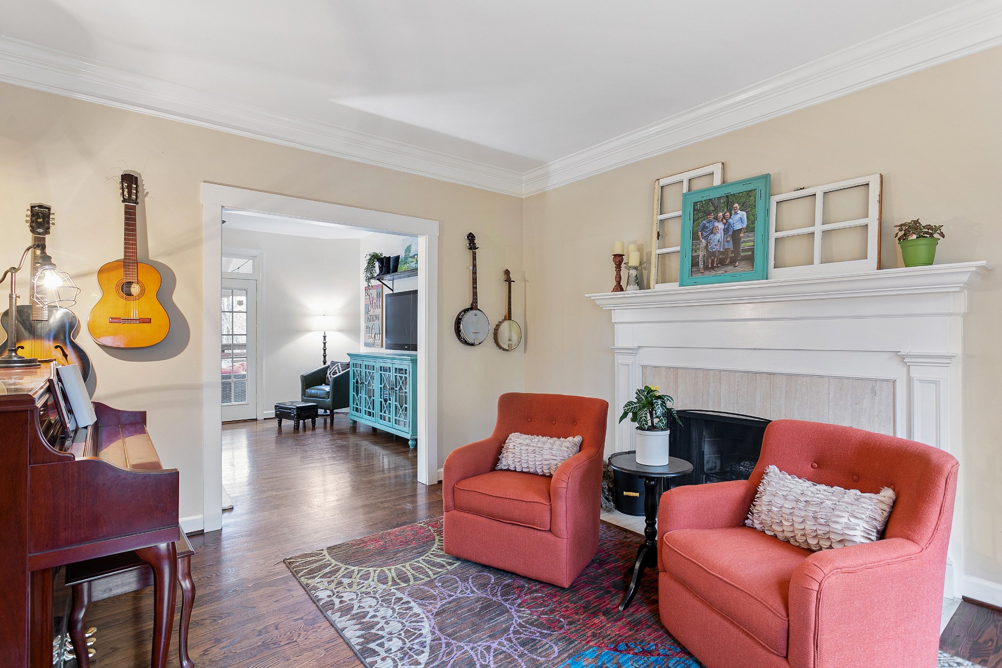 908 High Point Ridge Road Franklin, TN 37069 - Photo 14 of 69 a living room with furniture and a fireplace