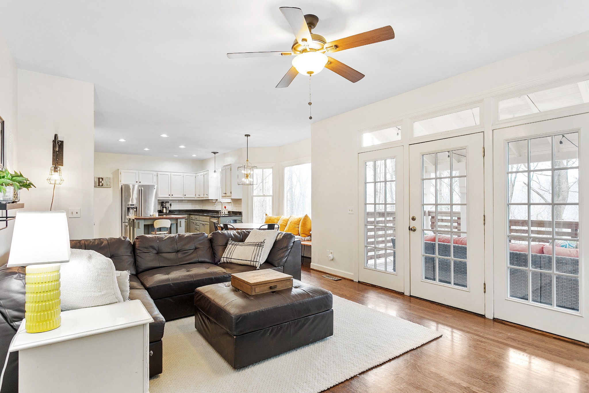 908 High Point Ridge Road Franklin, TN 37069 - Photo 16 of 69 a living room with furniture and kitchen view