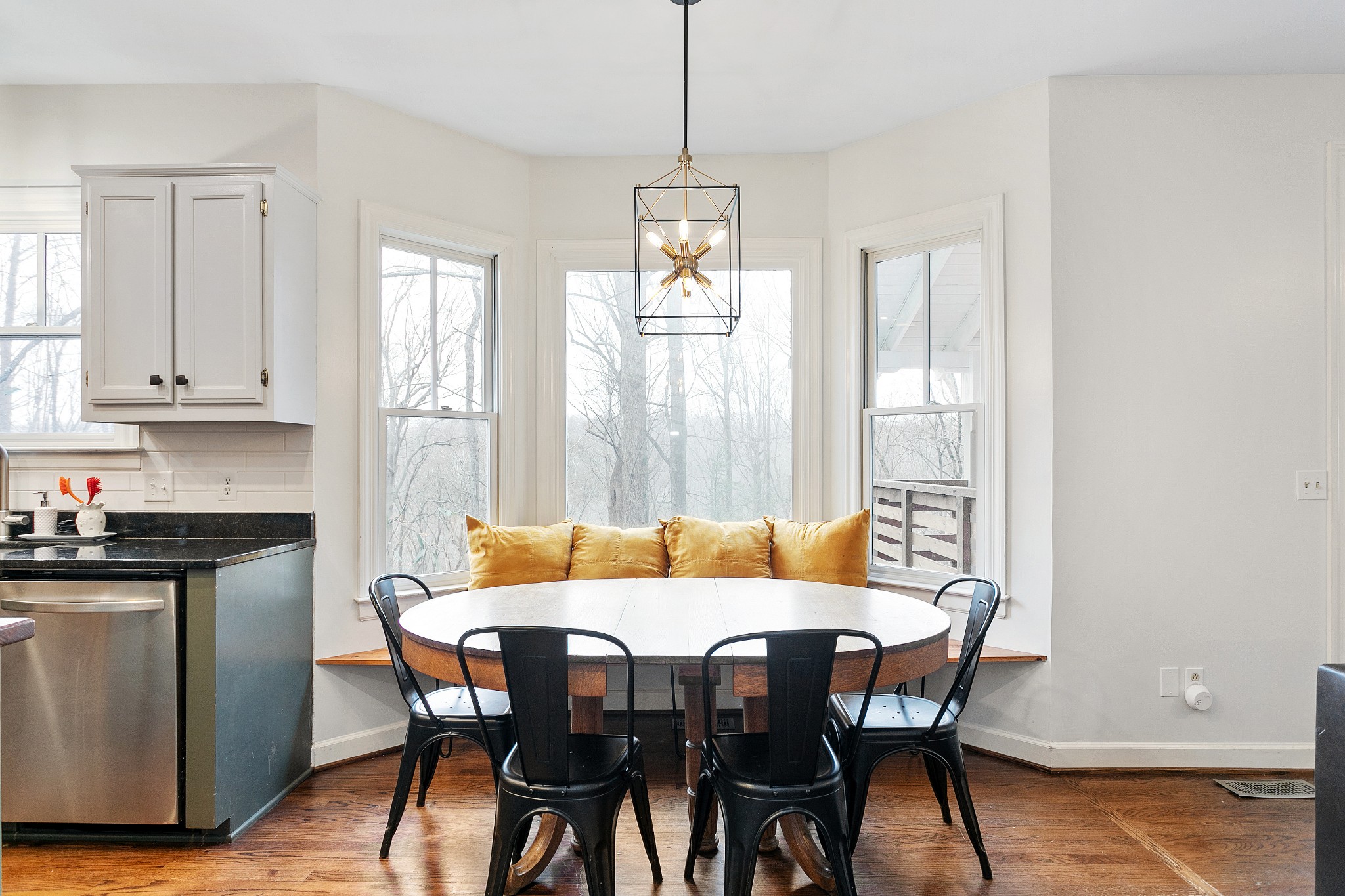 908 High Point Ridge Road Franklin, TN 37069 - Photo 22 of 69 a view of a dining room with furniture window and wooden floor