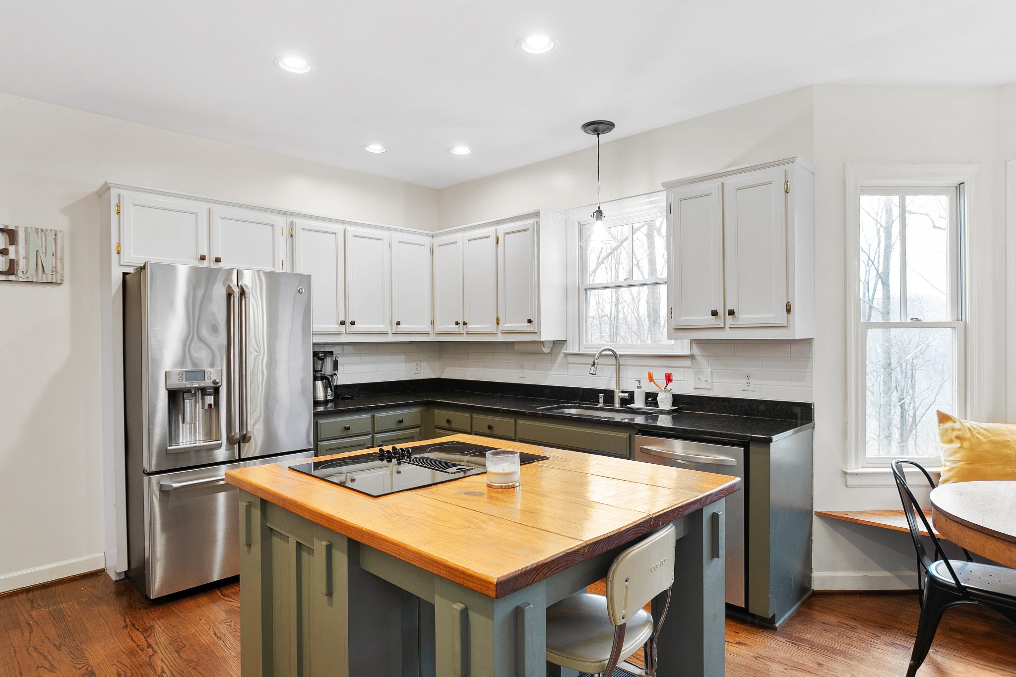 908 High Point Ridge Road Franklin, TN 37069 - Photo 25 of 69 a kitchen with a stove a refrigerator and a sink
