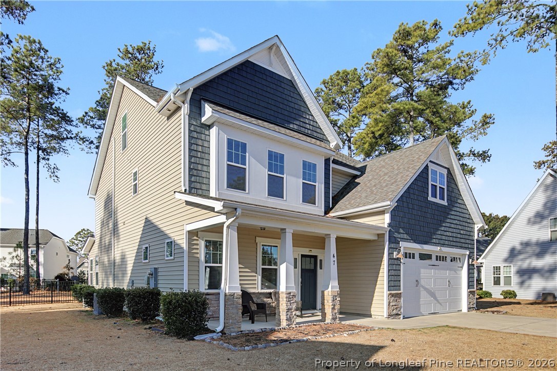 47 Pinnacle Drive Spring Lake, NC 28390 - Photo 4 of 50 a front view of a house with a tree