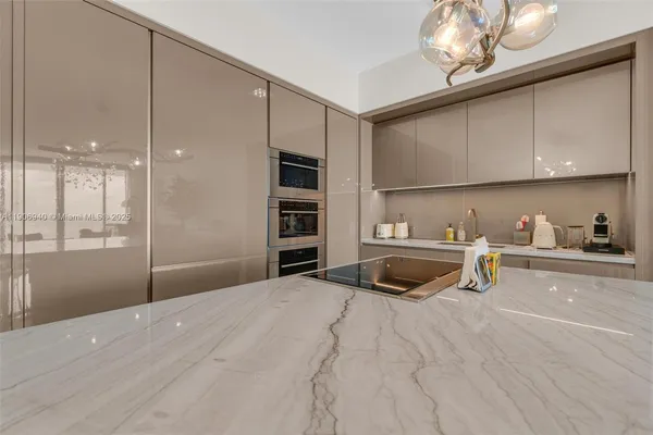 a bedroom with a bed and a cabinets with wooden floor