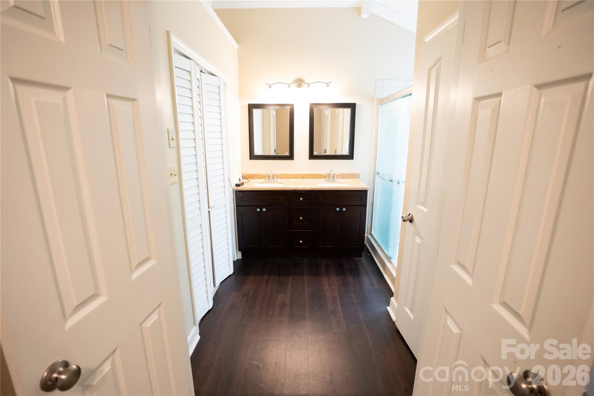 10737 Spruce Mountain Road Charlotte, NC 28214 - Photo 8 of 19 a bathroom with a sink and a mirror