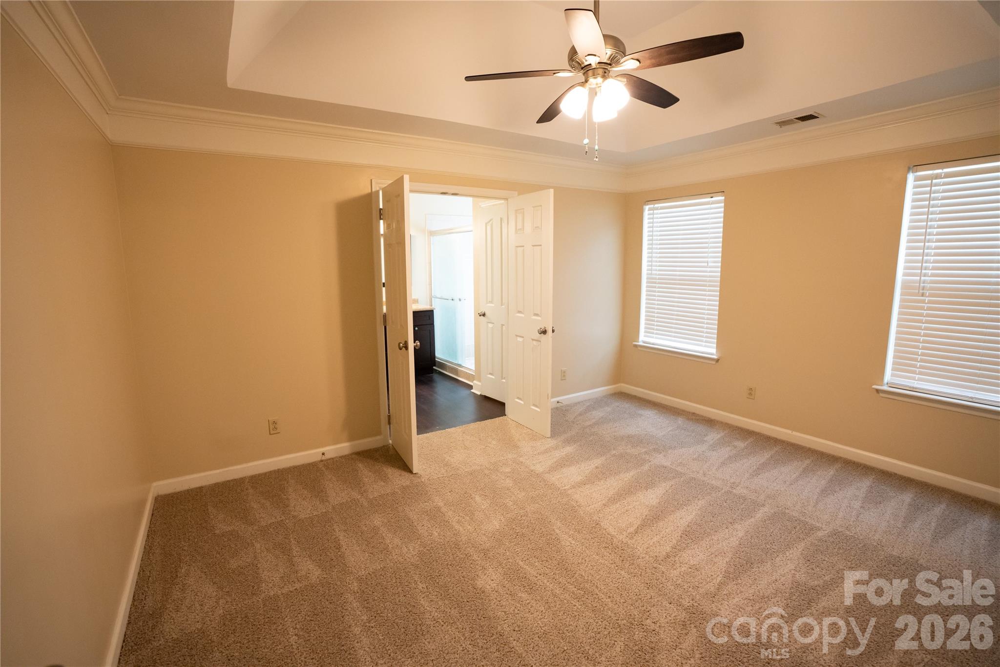 10737 Spruce Mountain Road Charlotte, NC 28214 - Photo 9 of 19 a view of an empty room with a window