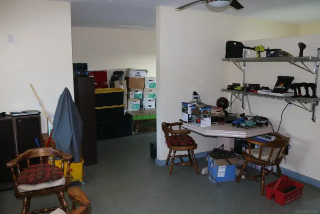 a view of a workspace with furniture