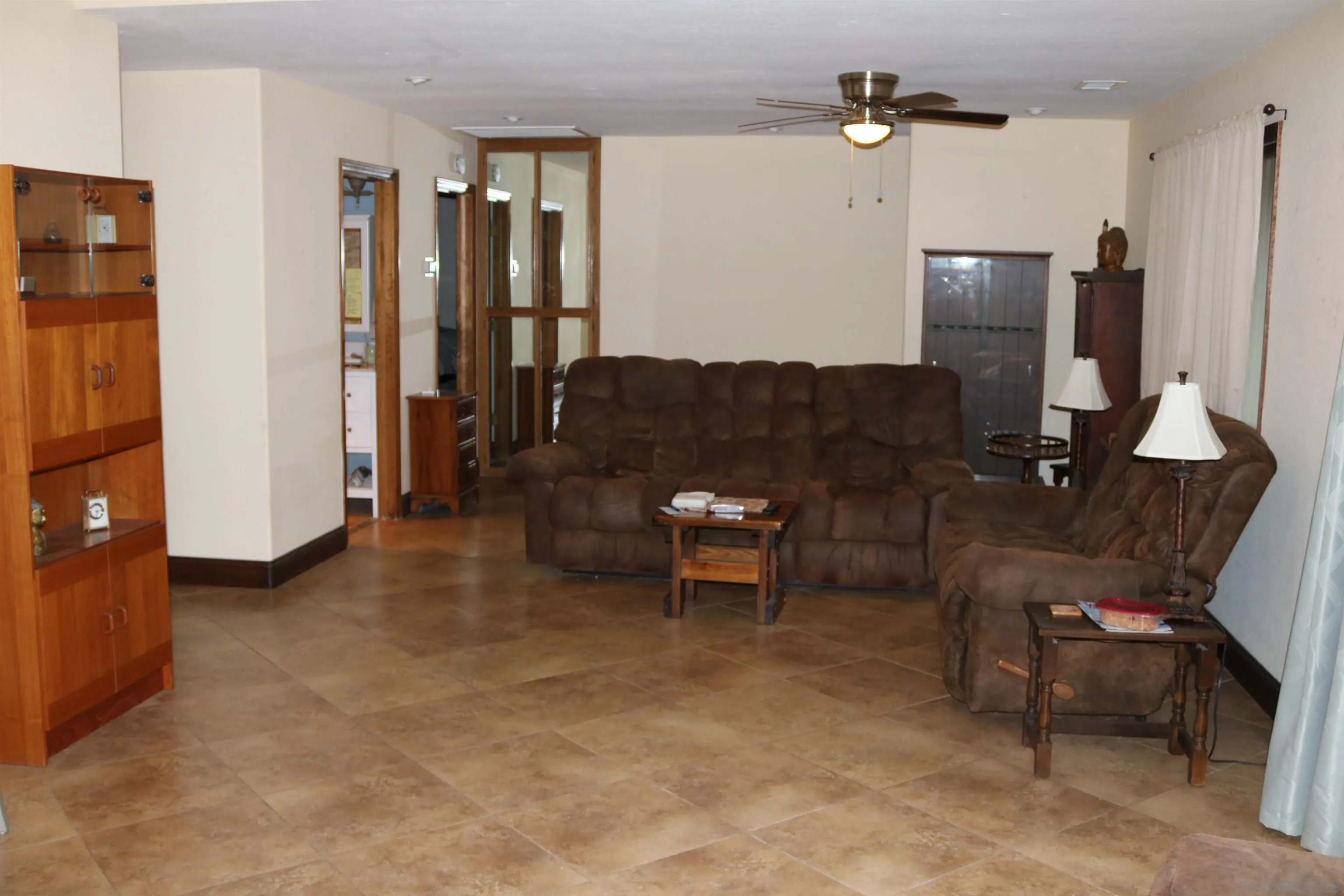 38083 De Luz Road Fallbrook, CA 92028 - Photo 6 of 29 a living room with furniture and a window