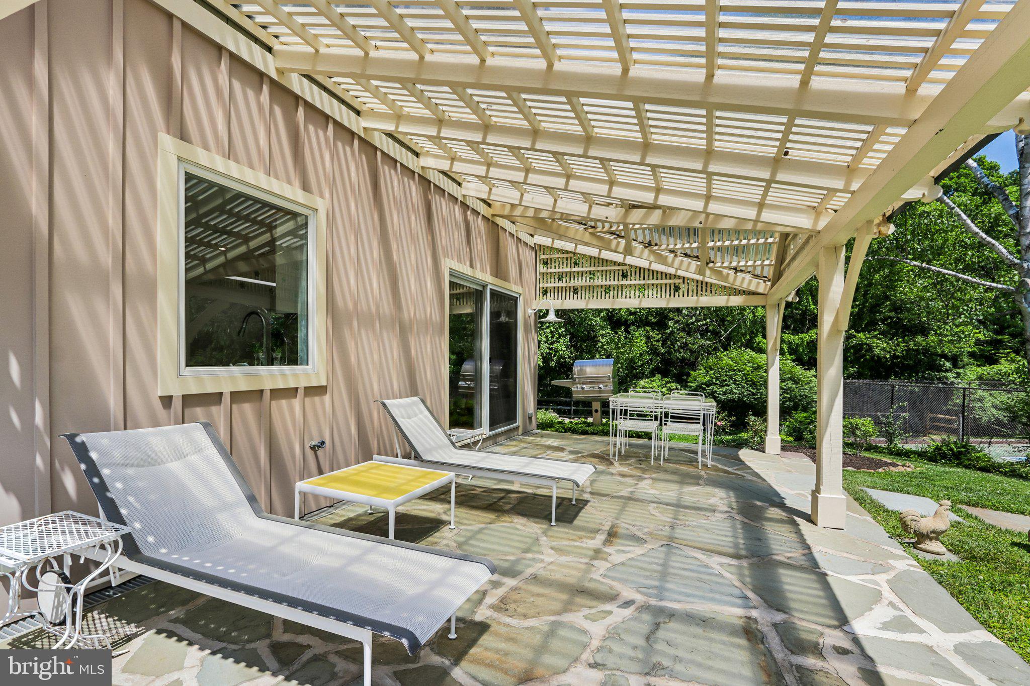 1673 Paper Mill Road Jenkintown, PA 19046 - Photo 61 of 73 a building outdoor space with patio furniture and garden