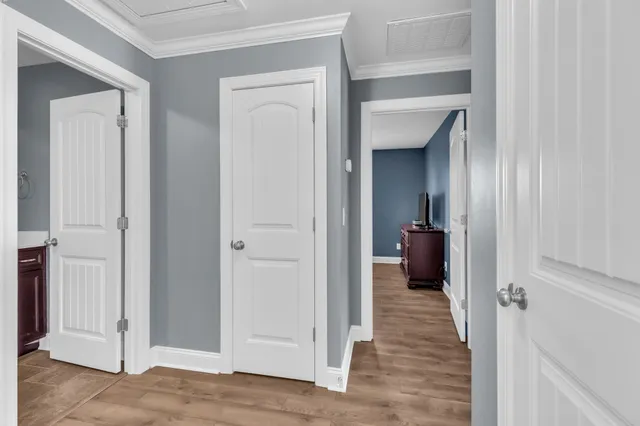 a bathroom with a toilet a sink and a mirror