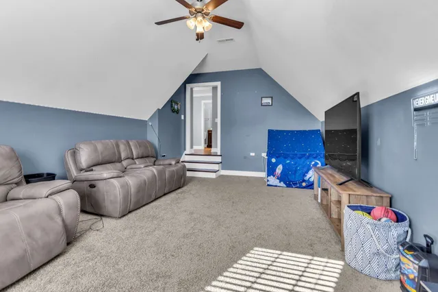 a swimming pool with outdoor seating yard and barbeque oven