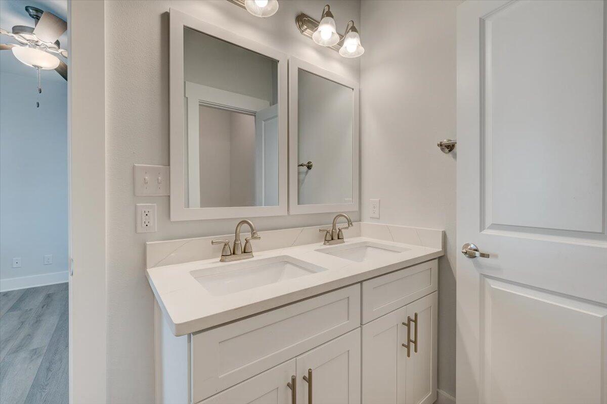 14 Alexander Way Freeport, FL 32439 - Photo 14 of 25 a bathroom with a sink and a mirror
