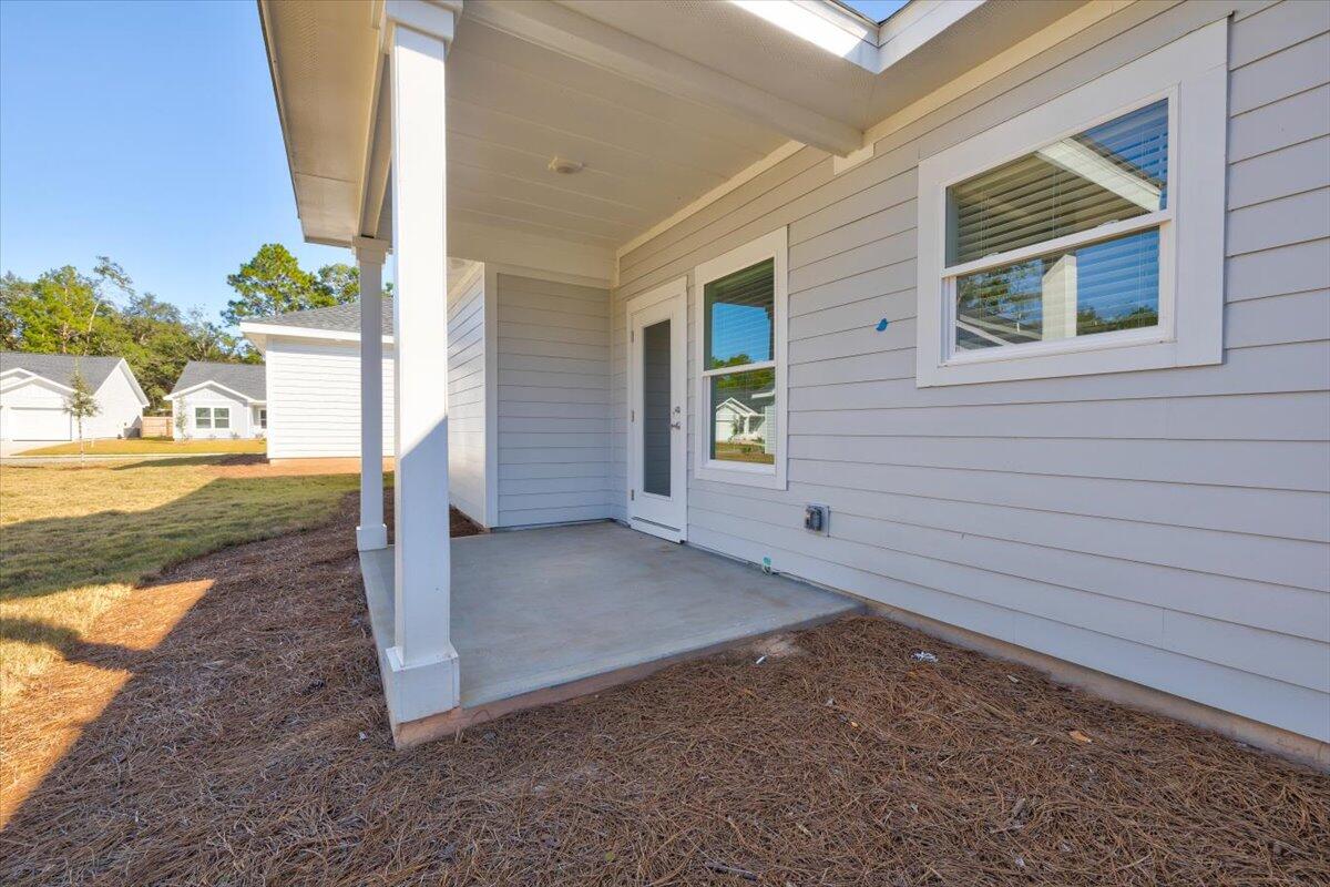 14 Alexander Way Freeport, FL 32439 - Photo 22 of 25 a view of a house with porch