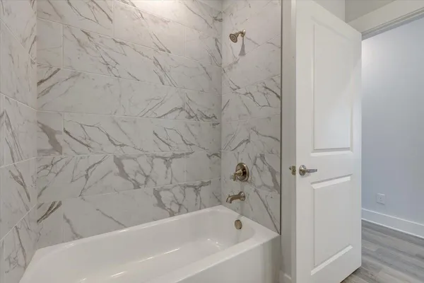 a bathroom with a bathtub