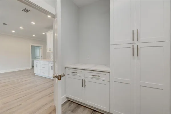 a view of a livingroom with wooden floor