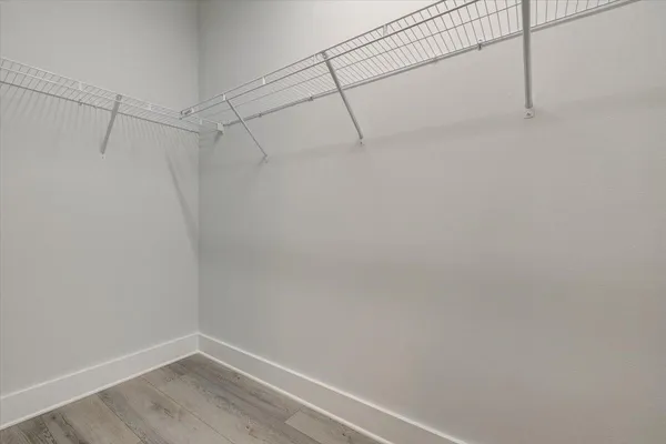 a view of a room with racks on the wall