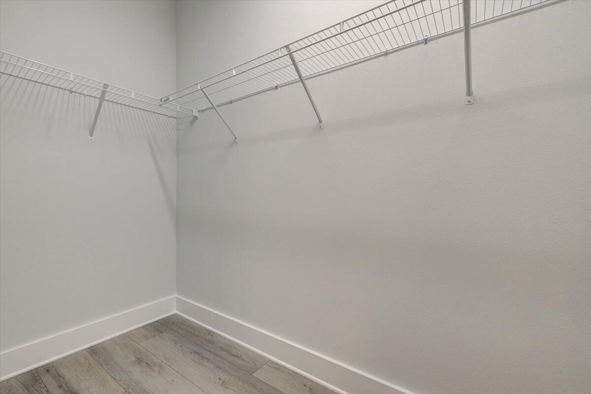 14 Alexander Way Freeport, FL 32439 - Photo 10 of 25 a view of a room with racks on the wall