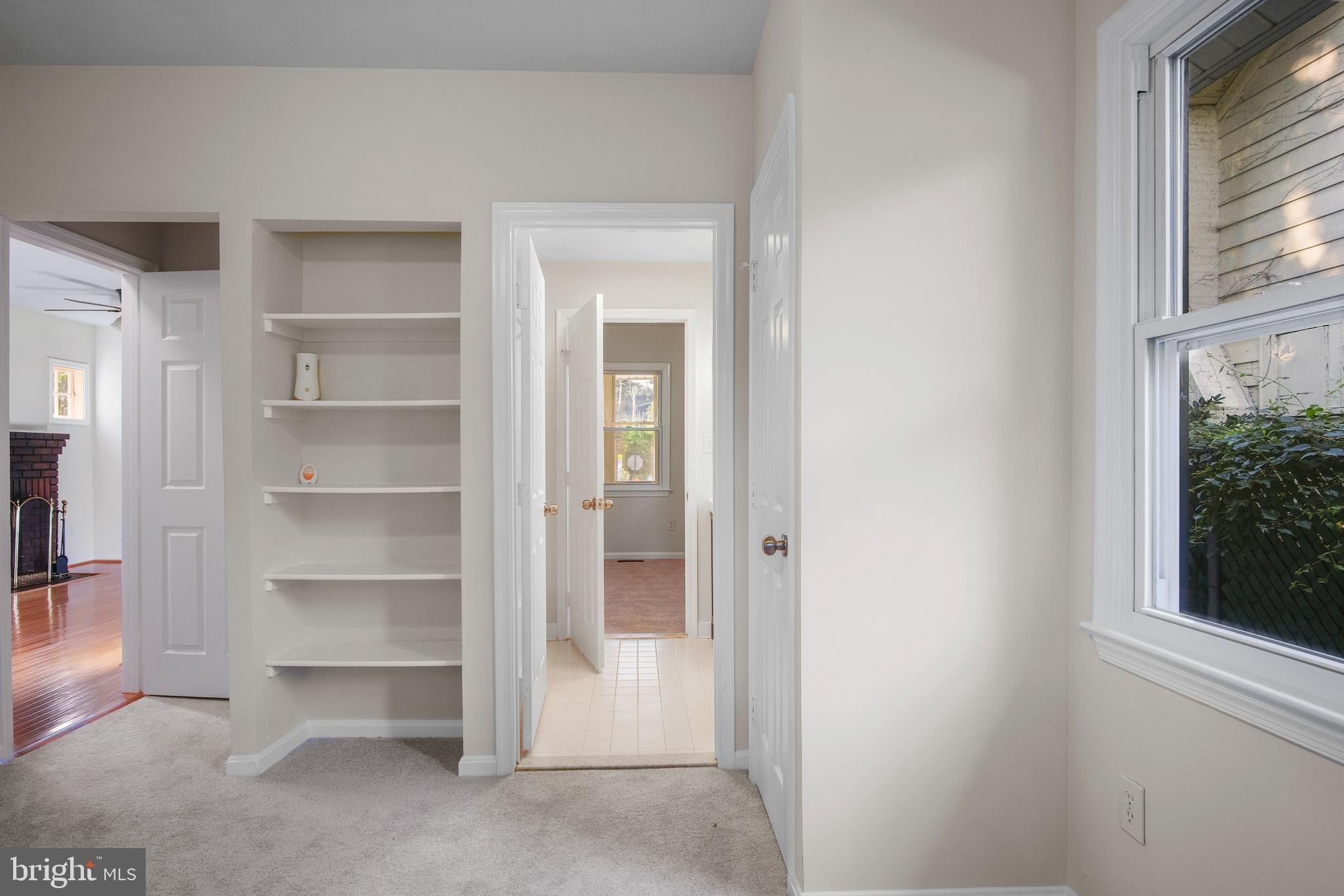 217 Peabody Street Northwest Washington, DC 20011 - Photo 18 of 27 a view of an empty room with a window