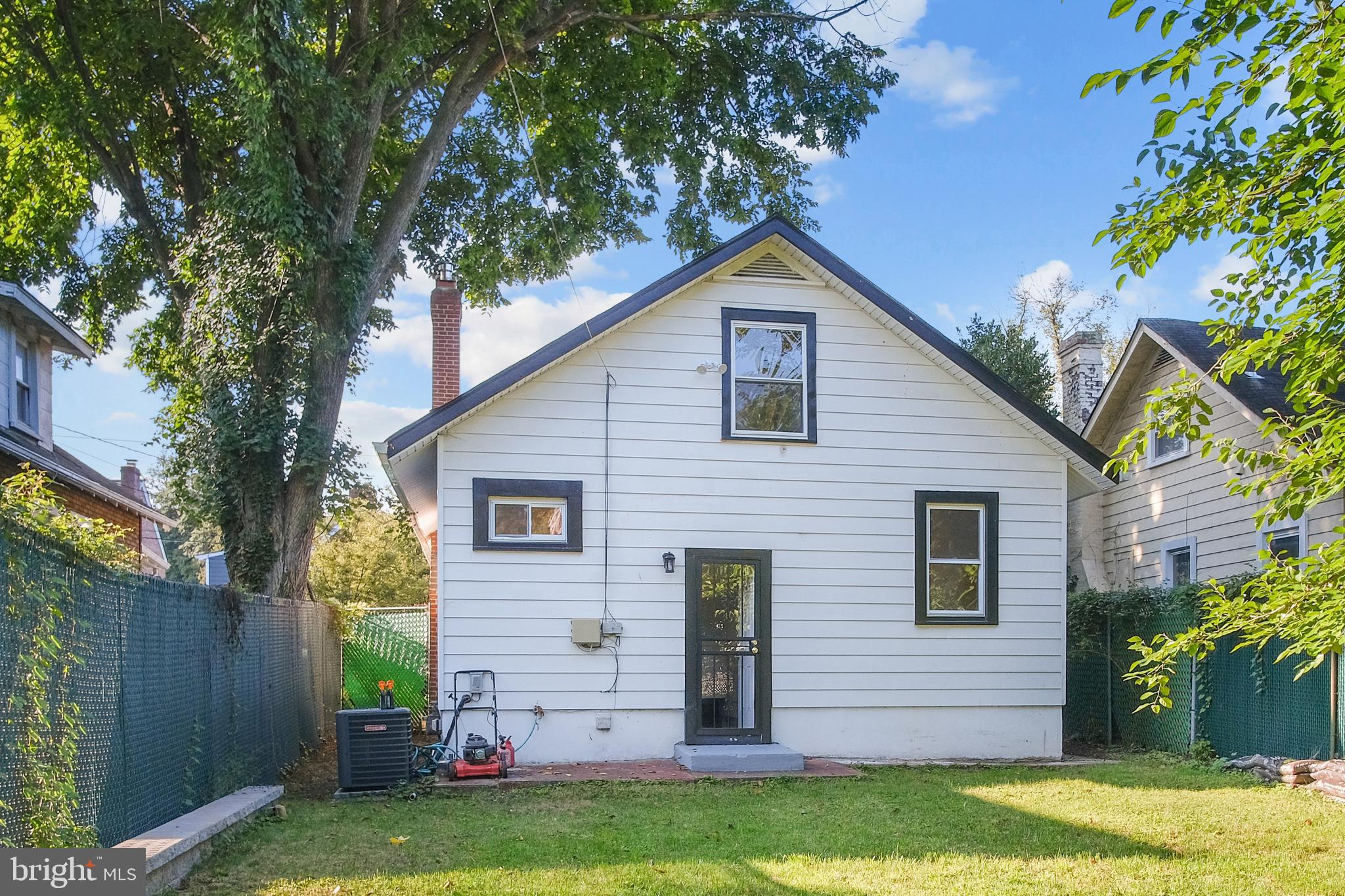 217 Peabody Street Northwest Washington, DC 20011 - Photo 23 of 27 a front view of house with yard and green space