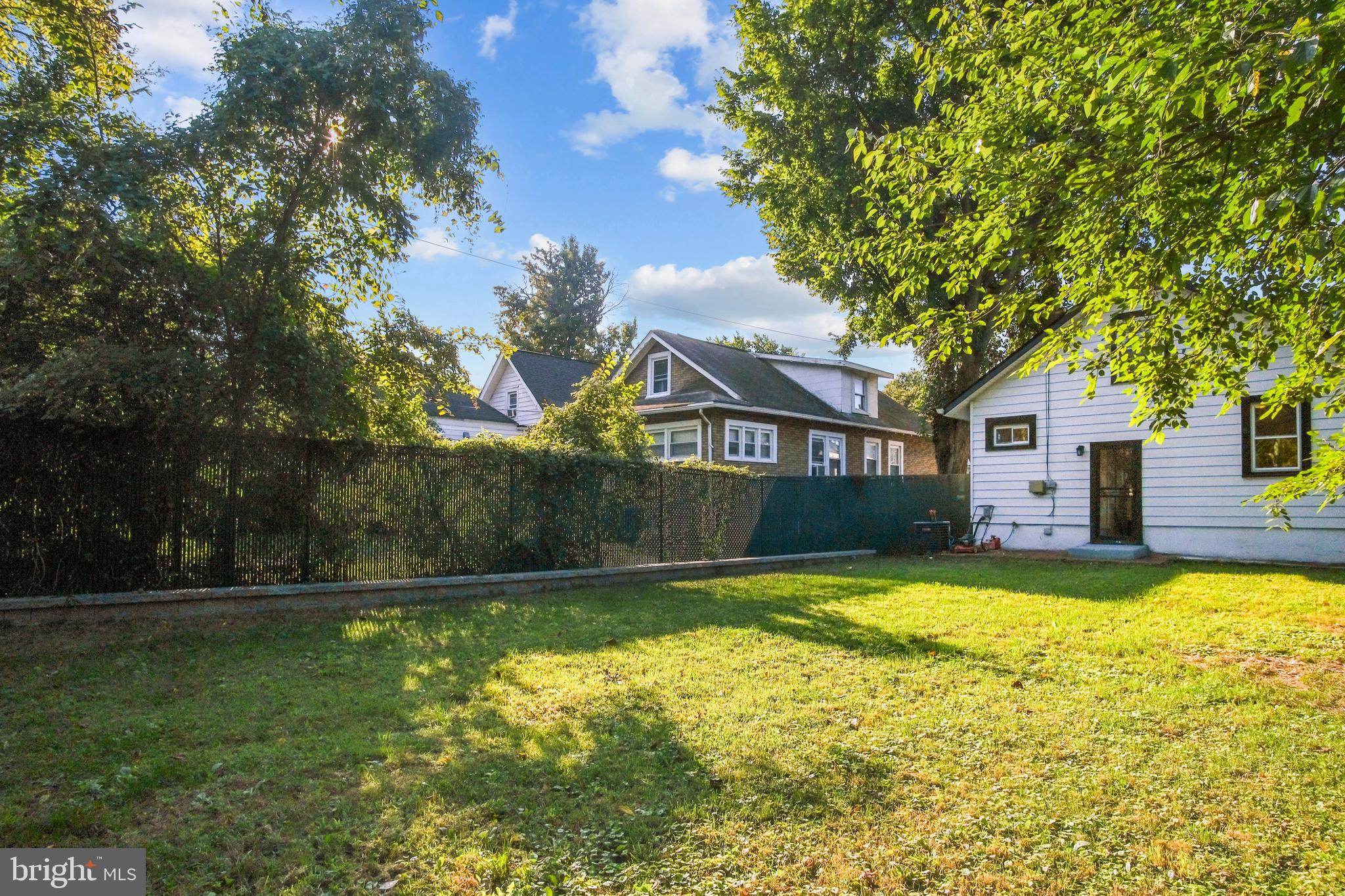 217 Peabody Street Northwest Washington, DC 20011 - Photo 25 of 27 a view of a house with swimming pool in a yard
