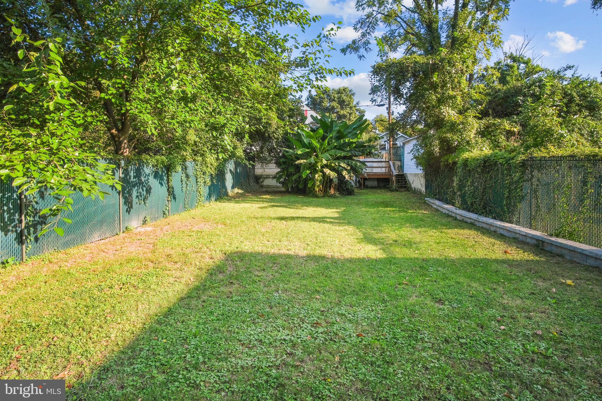 217 Peabody Street Northwest Washington, DC 20011 - Photo 27 of 27 a swimming pool with wooden fence