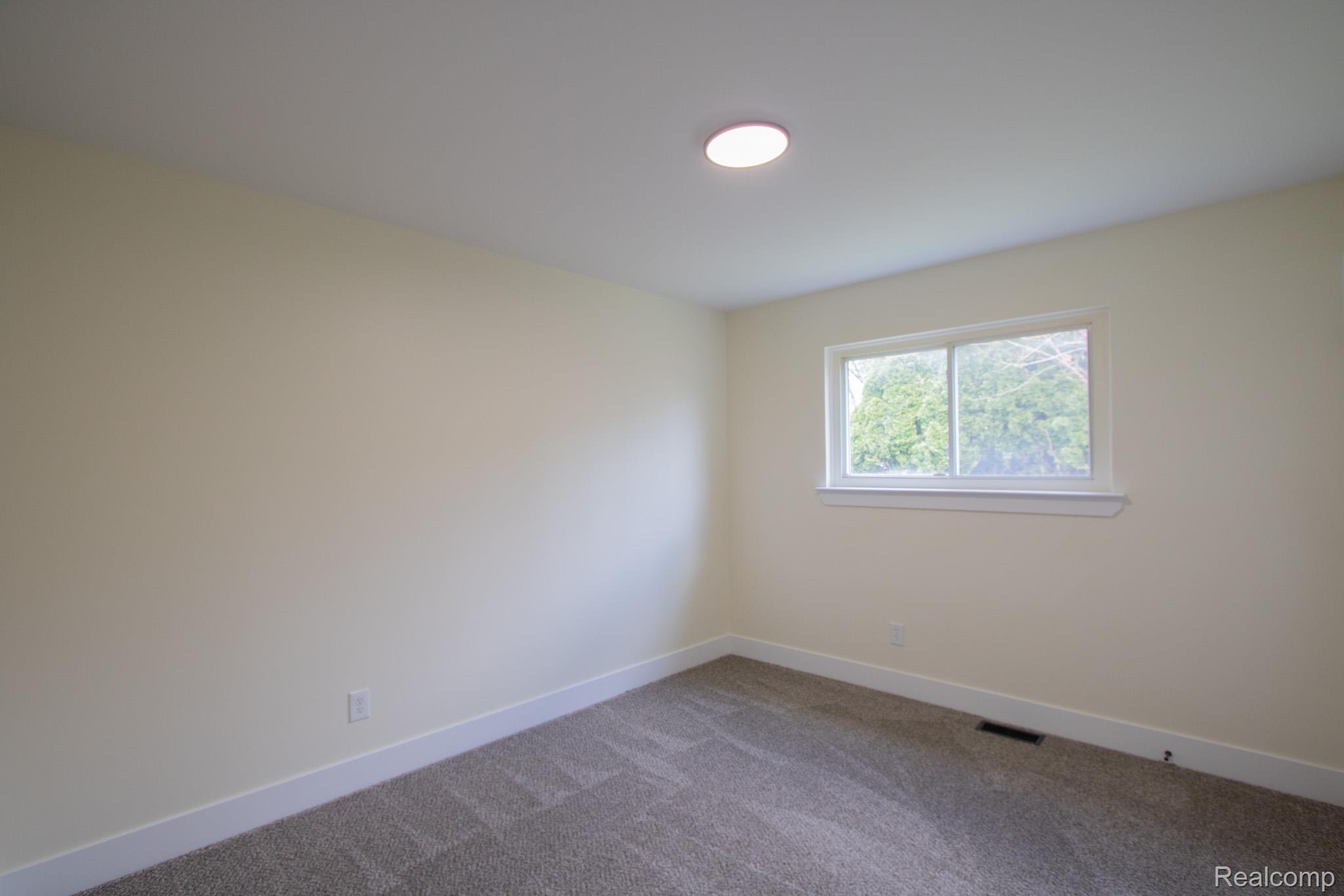 31000 Fall Fraser, MI 48026 - Photo 6 of 28 Unfurnished room featuring baseboards and carpet floors