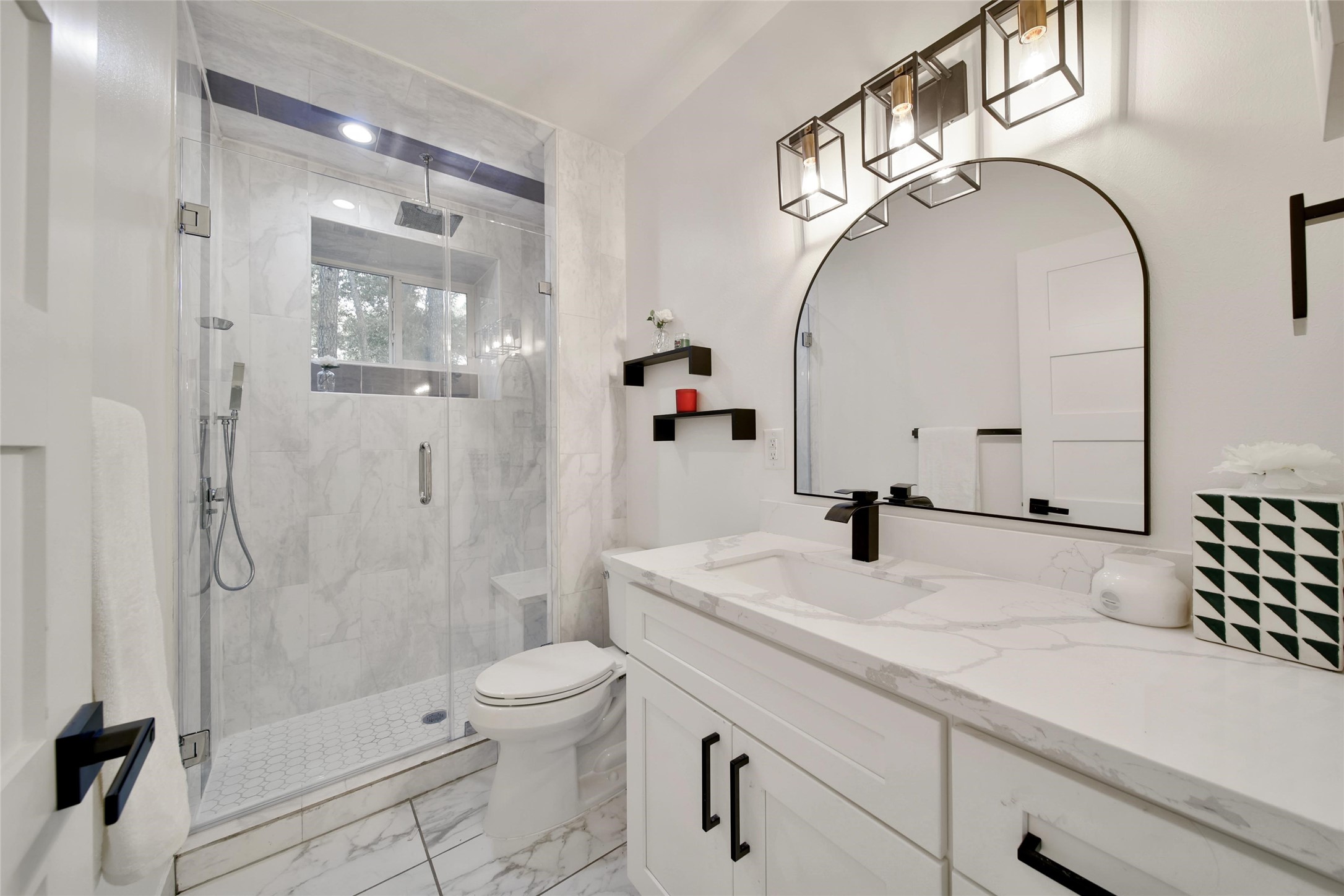 140 South Timber Top Drive Spring, TX 77380 - Photo 29 of 38 a bathroom with a sink a toilet and shower