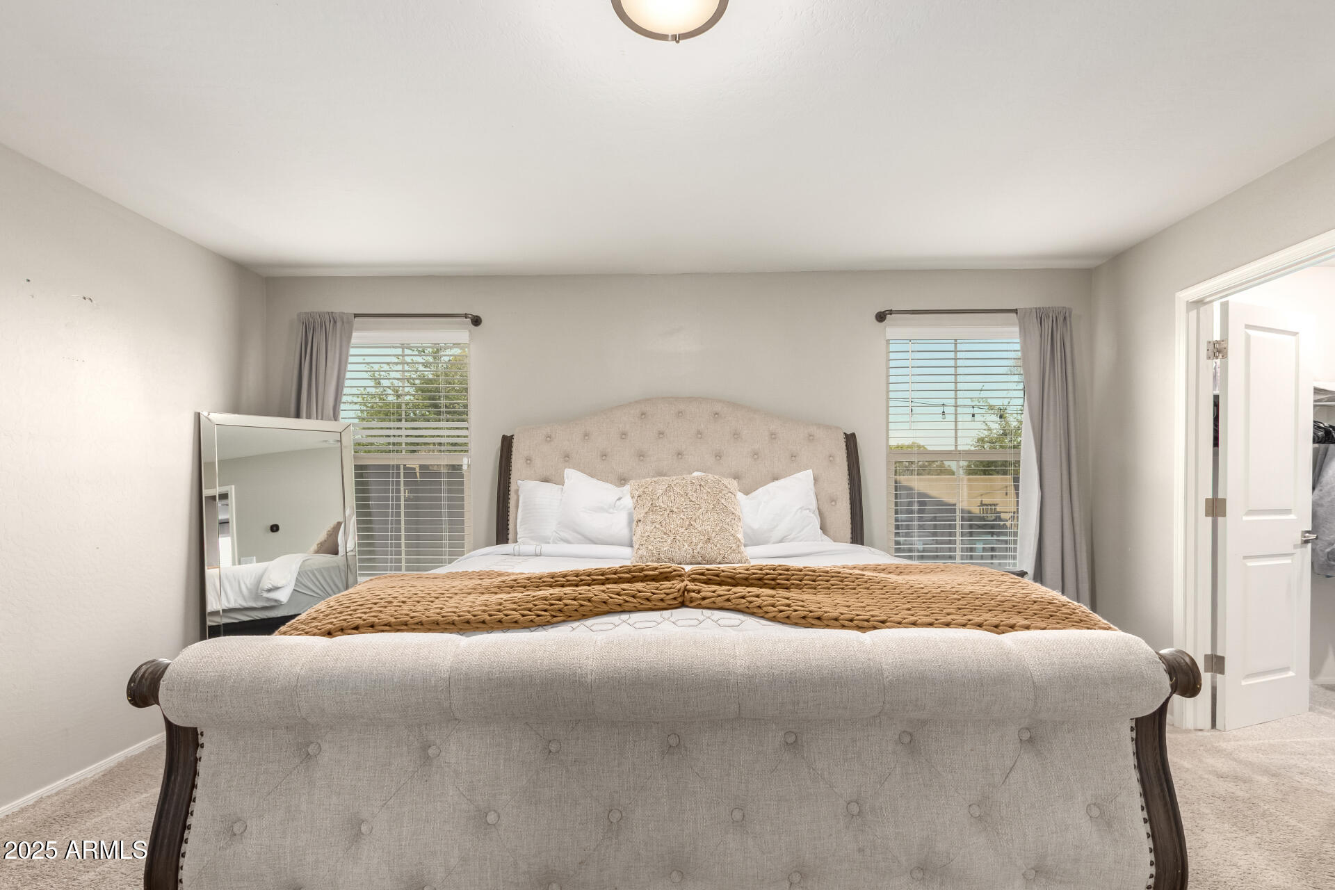 1133 South Rico Mesa, AZ 85204 - Photo 18 of 36 a bedroom with a large bed and a window