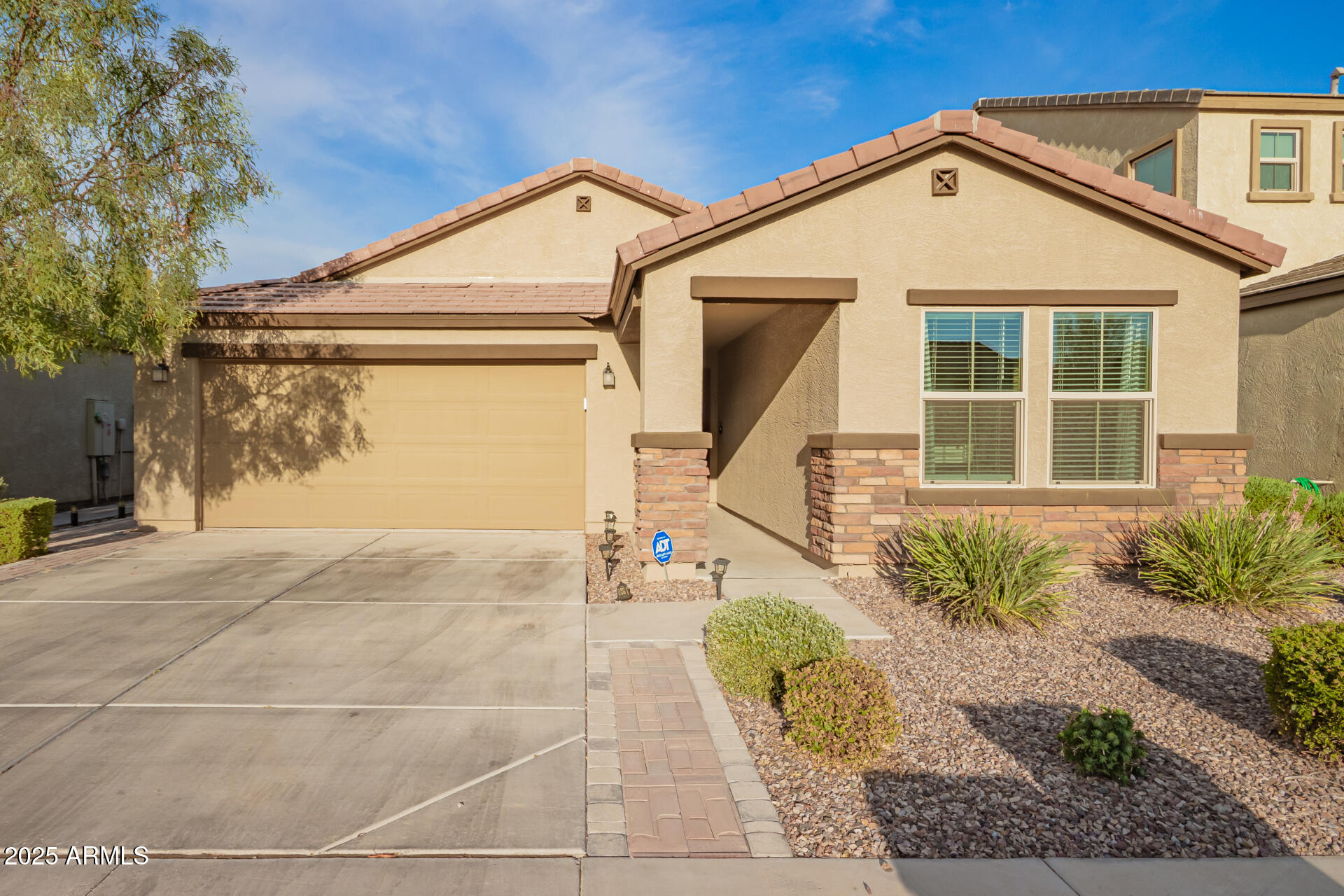 1133 South Rico Mesa, AZ 85204 - Photo 2 of 36 a front view of a house with garden