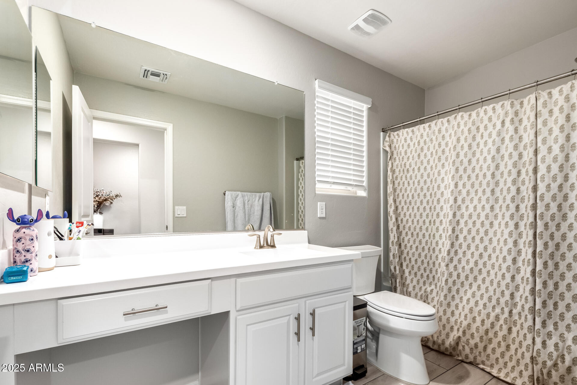 1133 South Rico Mesa, AZ 85204 - Photo 23 of 36 a bathroom with a double vanity sink toilet and a mirror