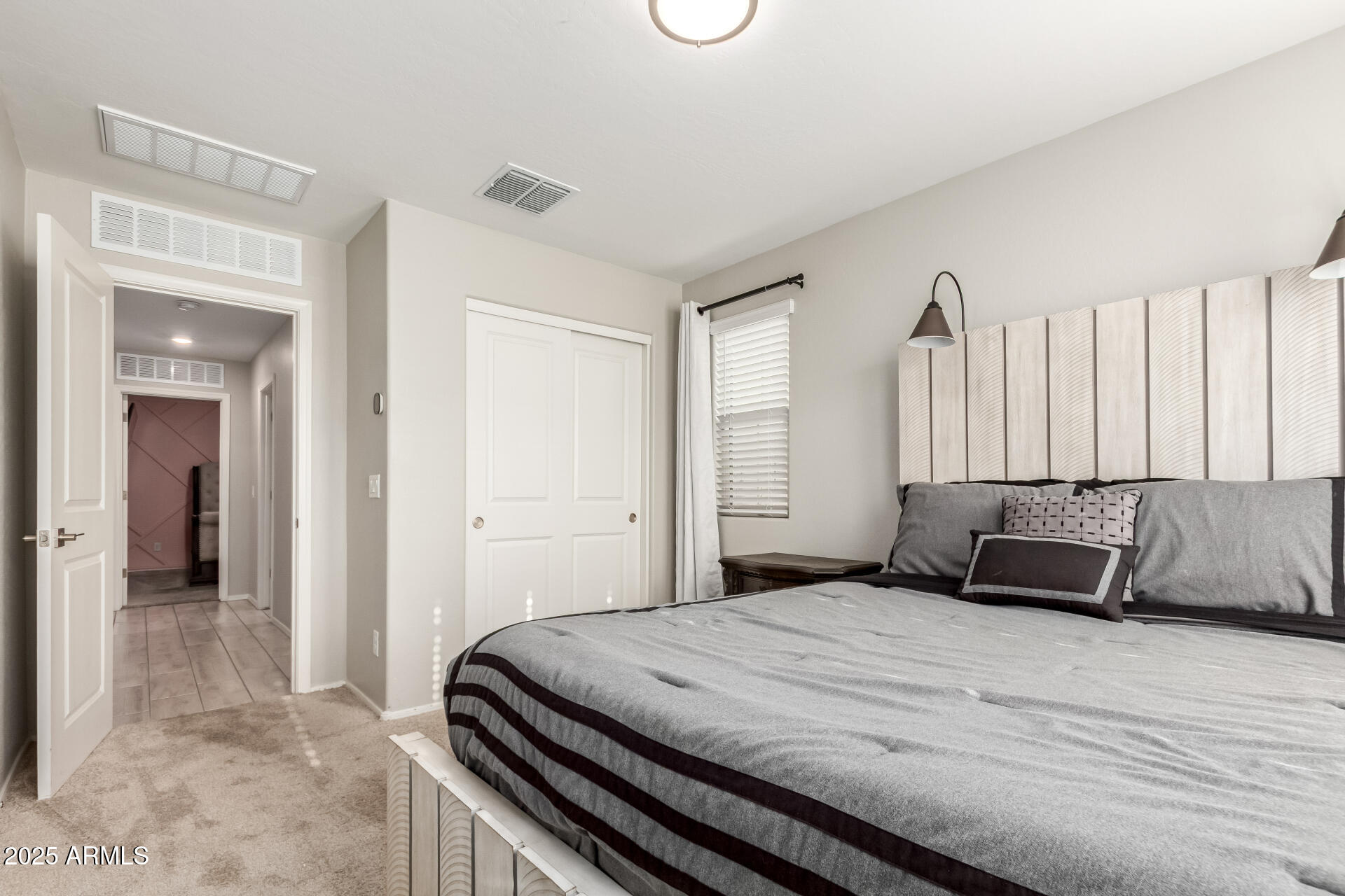 1133 South Rico Mesa, AZ 85204 - Photo 25 of 36 a bedroom with a bed and a large mirror