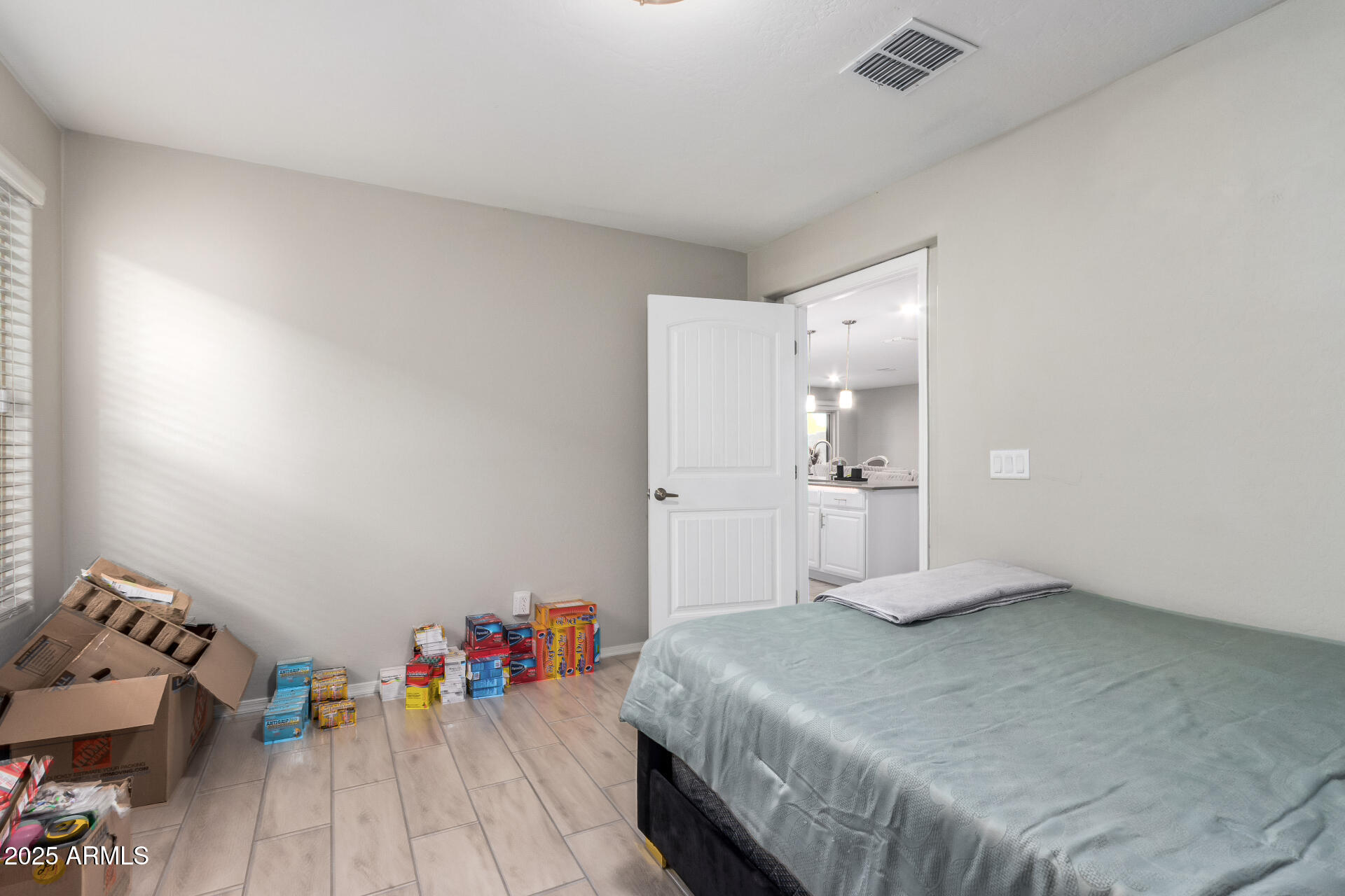 1133 South Rico Mesa, AZ 85204 - Photo 26 of 36 a bedroom with a bed and closet